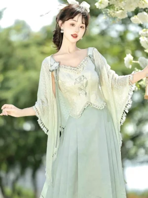 Sage green Spring Lyrics Ming-style Hanfu set with floral bustier mamianqun horse-face skirt and tassel shawl modeled in a spring garden