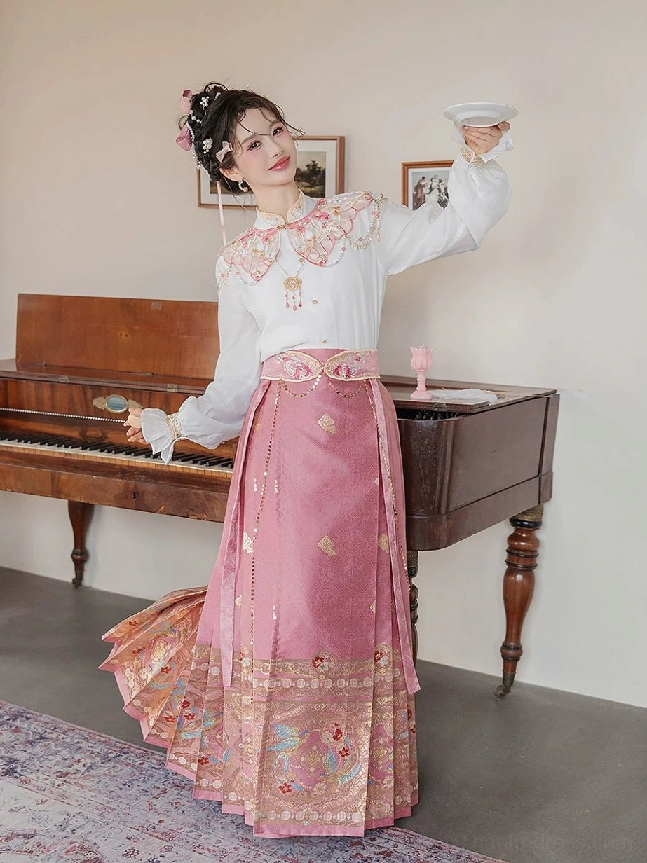 Side view of Spring Melodies modern Ming Dynasty Hanfu set showing the flowing embroidered mamianqun skirt and cloud collar accessory