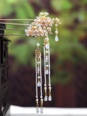 Hanfu Chinese hair stick with gold dual-pronged base, pink floral cluster, long beaded tassels, faux pearl details, and opalite teardrop pendants