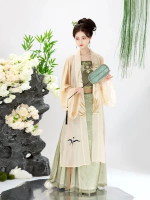 Full-body front view of a woman wearing a complete Song Dynasty Hanfu Qiyao Ruqun set with a cream Beizi coat, moss green camisole and pleated skirt in a Chinese garden studio