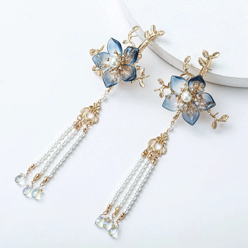 Pair of blue flower Hanfu side hair clips with gold-tone branch mounts, double pearl tassels and crystal drop accents