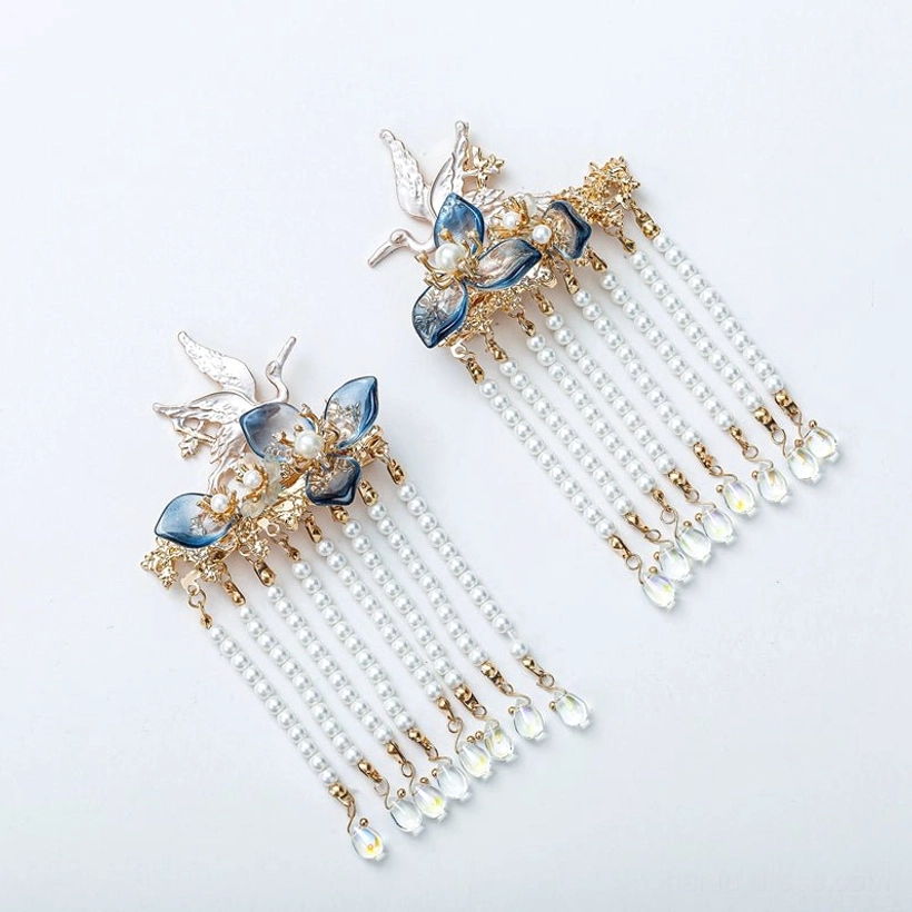 Pair of Starlight Hanfu tassel hair clips with blue glass flowers, crane ornaments, pearl chains and iridescent crystal pendants