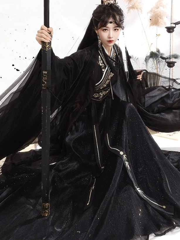 Black Starry Night Qiyao Ruqun Hanfu with gold embroidery, oversized sheer sleeves, flowing skirt, and sword-inspired xianxia styling