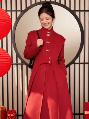 Red modern Hanfu winter coat worn by a smiling woman indoors with festive Chinese red lanterns, stand collar, fitted waist, metal closures, and side pocket