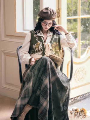 Modern Hanfu knit vest and bamboo print maxi skirt outfit styled in a vintage indoor portrait with dark green embroidered vest