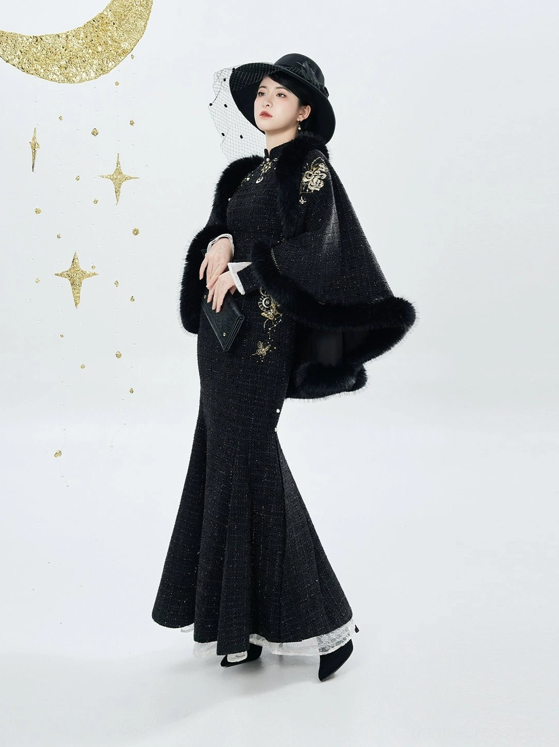 Side view of black embroidered mermaid qipao dress with gold floral embroidery and plush-trim cloak in modern Chinese style