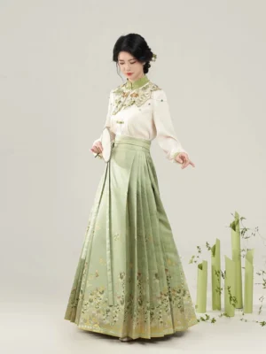 Front view of Sunshine Rose Chinese Hanfu outfit with stand collar blouse high waisted sage green embroidered mamian skirt