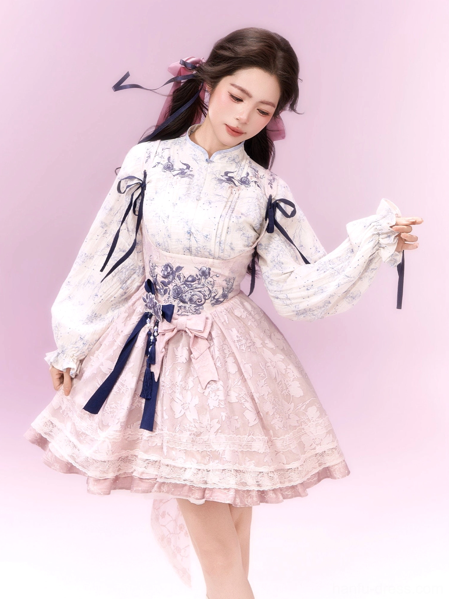 Sweet pink xianxia Hanfu Lolita dress with puff sleeves, ribbon ties, lace-trimmed ruffle hem, and decorative waist bow