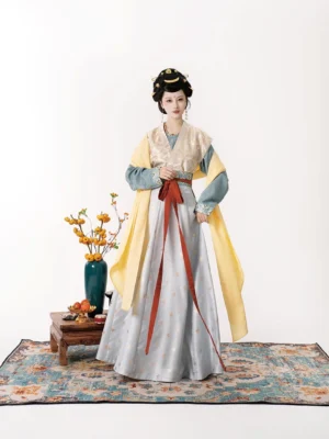 Front full-body view of a Tang Dynasty Hanfu Beizi Qiyao Ruqun set with dusty blue inner top, ivory patterned vest, grey silk wrap skirt, red sash, and yellow outer layer