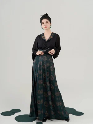 Tang Dynasty inspired Hanfu set with black jacquard lantern sleeve top and dark green nine-panel mamian skirt front view
