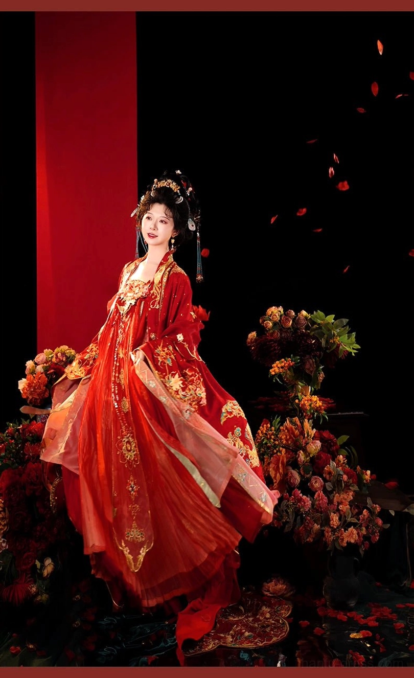 Tang Dynasty Hanfu bridal wedding dress featuring fitted red upper gown, rich golden embroidery, flowing layered skirt, and traditional Chinese bridal styling
