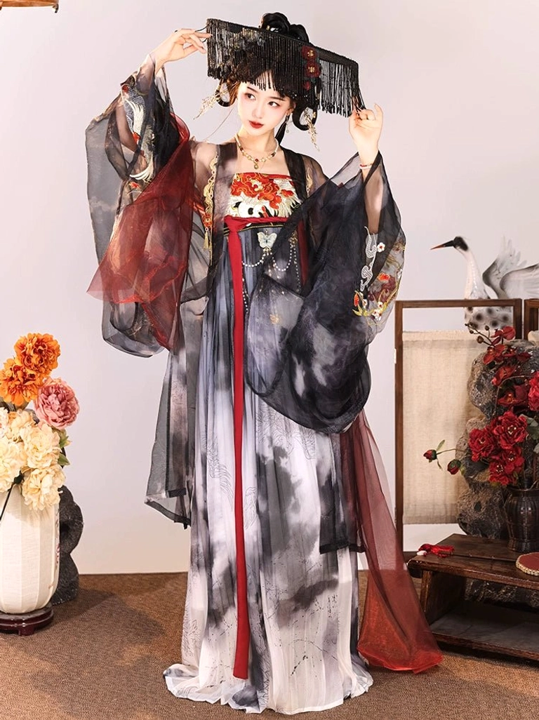 Three-quarter front view of Tang Dynasty style Hanfu dress with dark red and black sheer outer coat, ink-wash skirt, embroidered bust, and red waist sash