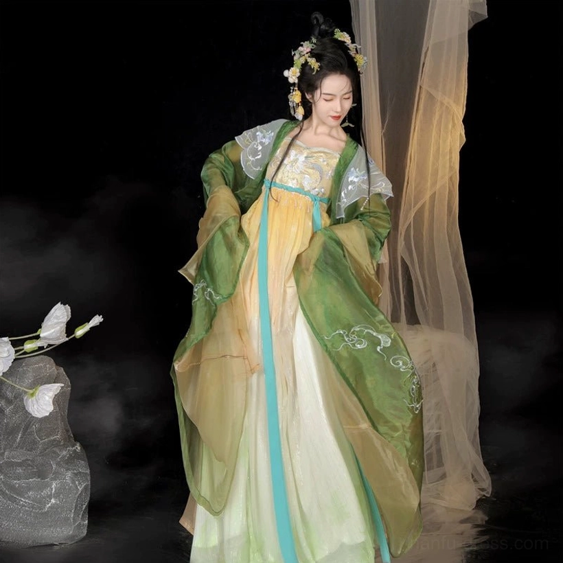 Front view of a Tang Dynasty Hanfu Heziqun dress complete set with yellow green and ivory ombre skirt embroidered wide sleeves cyan waist sash and white cloud shoulder decoration
