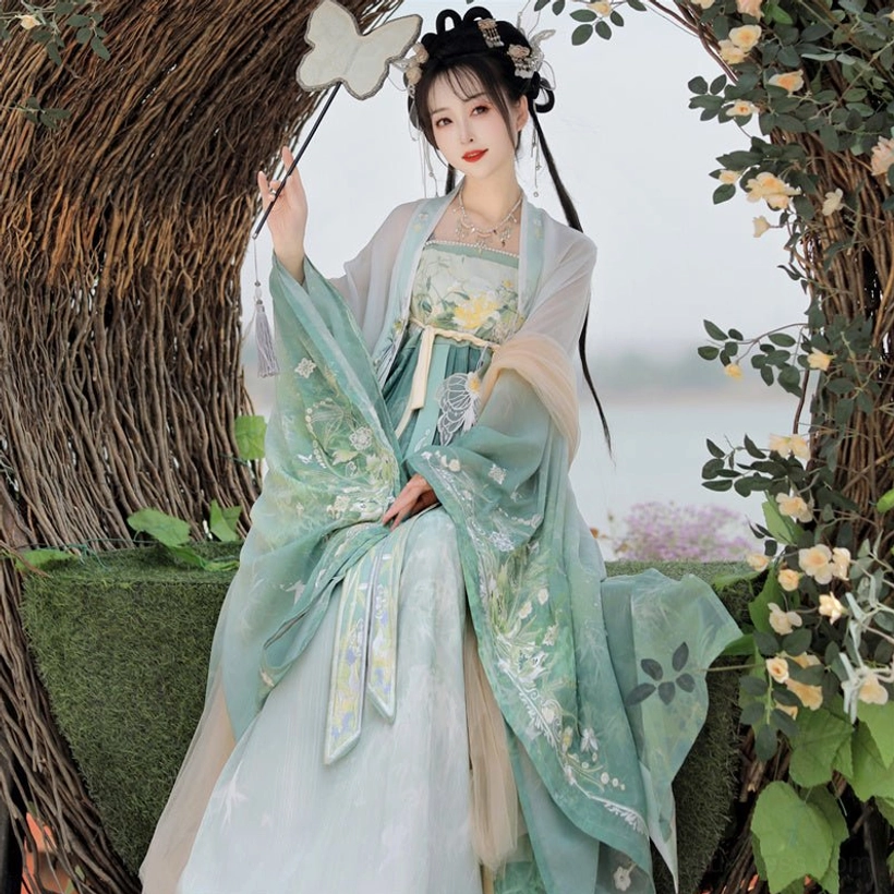 Green Tang Dynasty Hanfu Heziqun complete set close view with mint green floral embroidered wide sleeve robe, light cyan dress and butterfly accessory