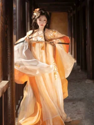Tang Dynasty Hanfu Qixiong Ruqun in warm orange and cream gradient with embroidered wide sleeves, modeled with a bamboo flute in a traditional wooden corridor