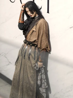 Full body side view of a male model wearing the brown River Essence Tang Dynasty Hanfu robe complete set with jacquard fabric black leather belt and embossed leather arm guards
