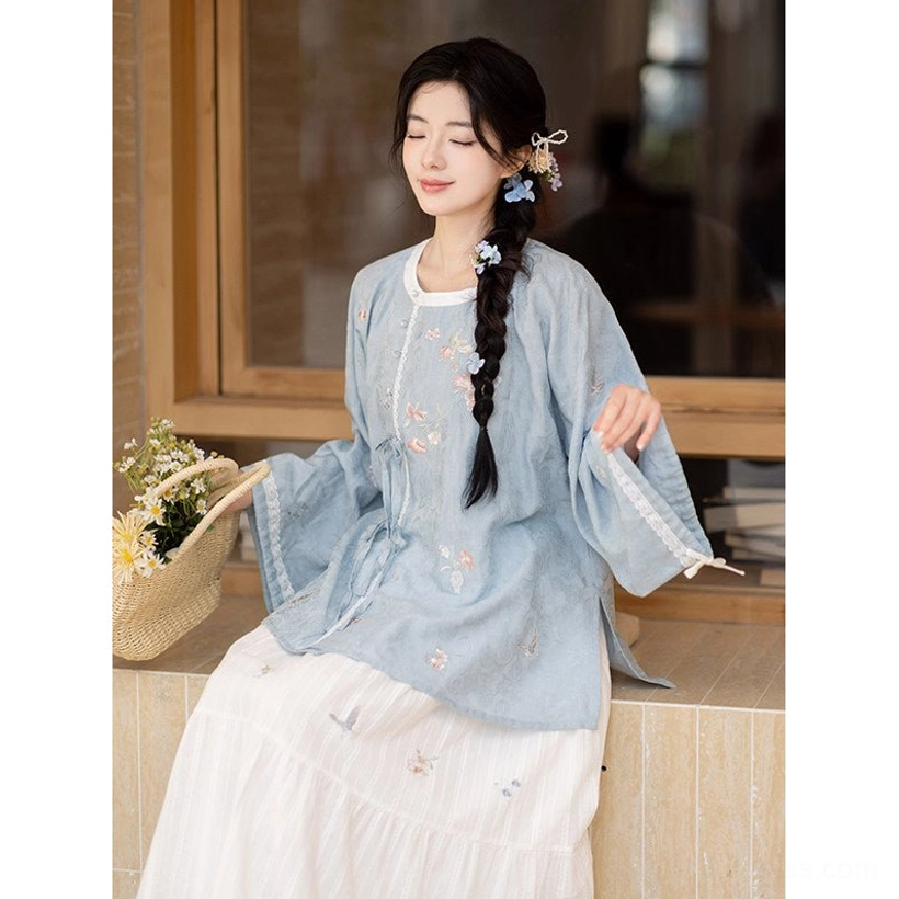 Tang Dynasty inspired embroidered blue Hanfu top and white layered cotton skirt full set seated profile view