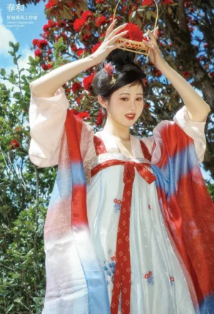 Front full-body view of Tang Dynasty inspired gradient modern Hanfu dress set with off-white bodice, red waist accent, blue red outer layers, and wide sleeves