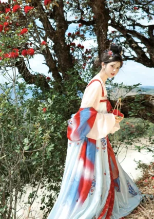 Side full-body view of Tang Dynasty inspired modern Hanfu dress set with red blue gradient shawl, wide sleeves, floral embroidered skirt, and high-waisted ruqun silhouette