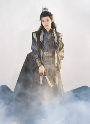Front view of a complete male hanfu set inspired by Tang Dynasty royal clothing, featuring a navy robe, black layered outer vest, gold embroidery, decorative waist accessories, and coordinated arm guards
