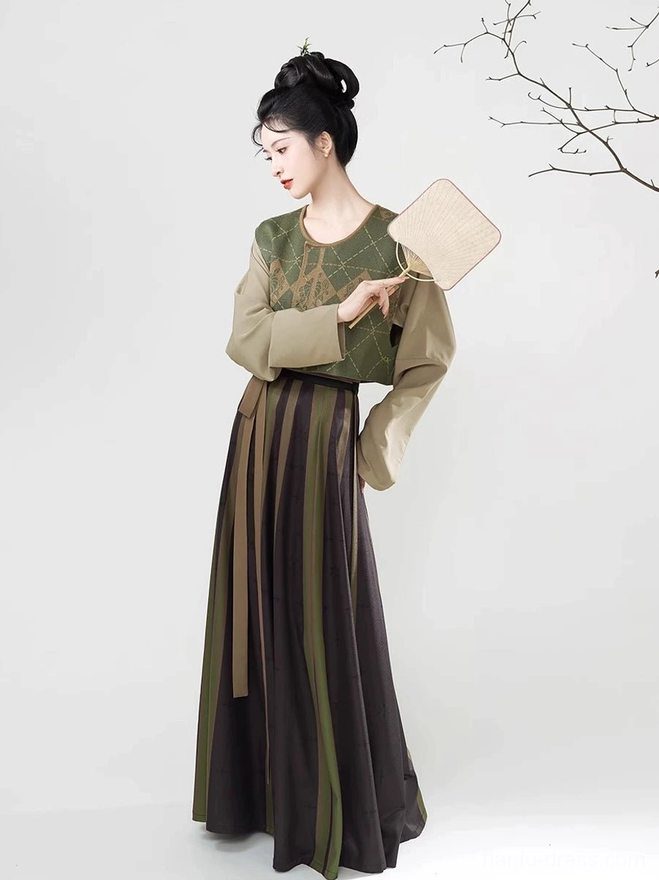 Three-quarter full-body view of a green Tang Dynasty modern Hanfu set with argyle beizi overlay, striped eight-panel wrap skirt, matching waist ribbon, traditional hairstyle, and round hand fan