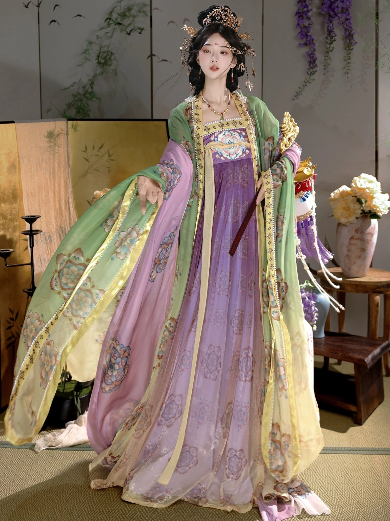 Three-quarter view of Tang Dynasty Qixiong Ruqun hanfu with purple and yellow gradient skirt, green outer sleeves, and floral patterns