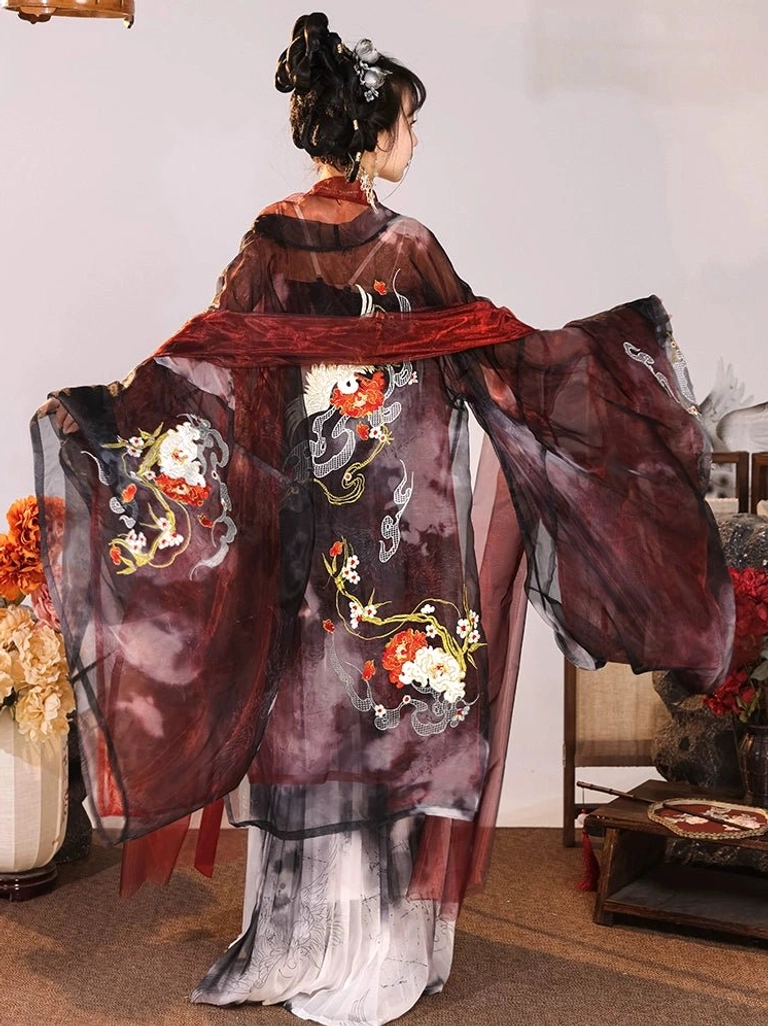 Back view of a Tang Dynasty Qixiong Ruqun Hanfu dress showing wine-red sheer coat, floral back embroidery, long ink-wash skirt, and matching sash