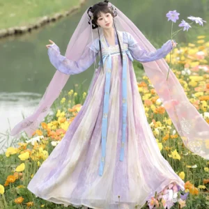 Front view of a Tang Dynasty Hanfu Qixiong Ruqun set with lavender pink cream gradient skirt light blue embroidered waist ribbons and floral garden background