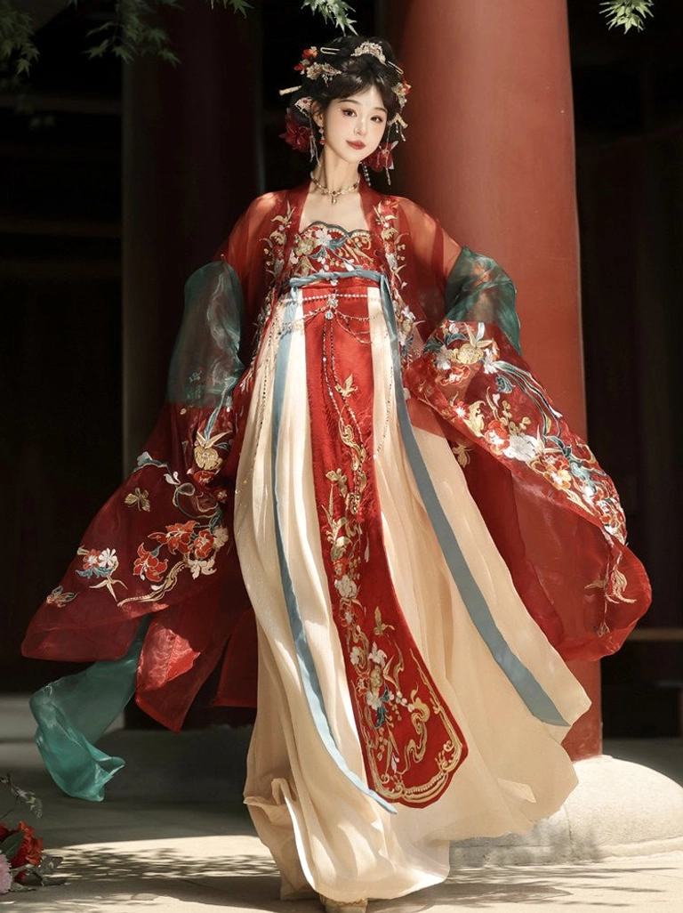 Side view of a Tang Dynasty Qixiong Ruqun Hanfu dress showing the flowing beige skirt, teal waist trim, red embroidered upper garment, and translucent outer cape