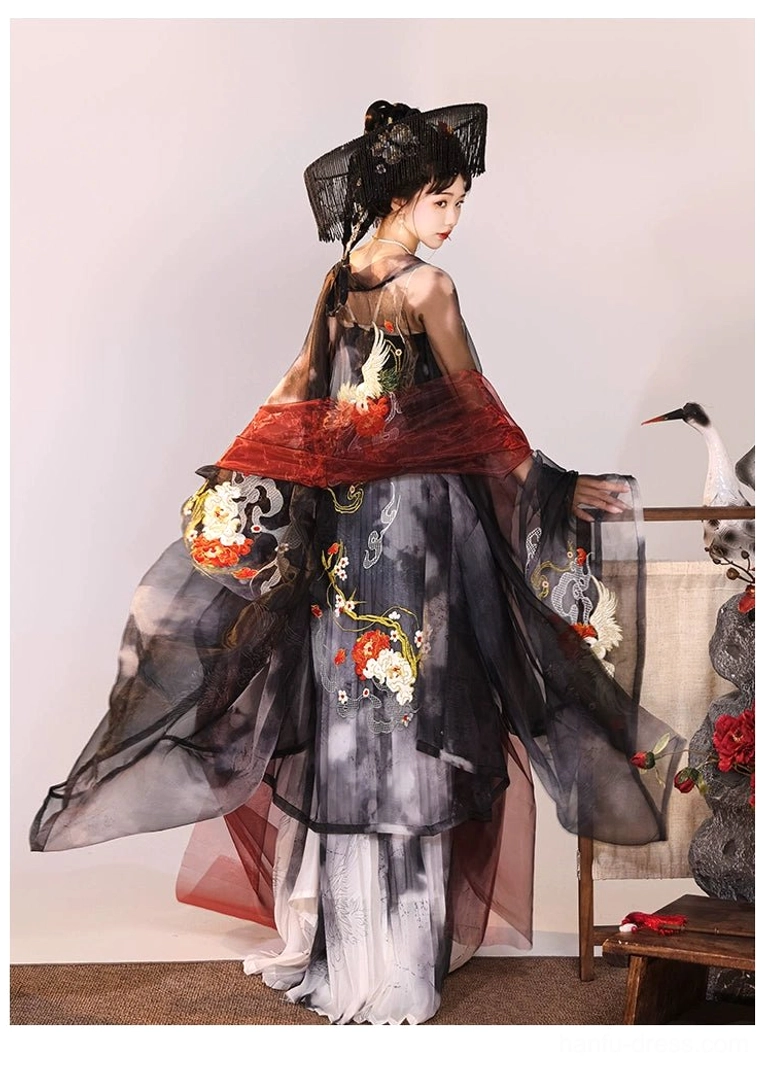 Three-quarter back view of Tang Dynasty style Qixiong Ruqun Hanfu with red sheer shawl, floral embroidered ink-wash skirt, and cropped embroidered top
