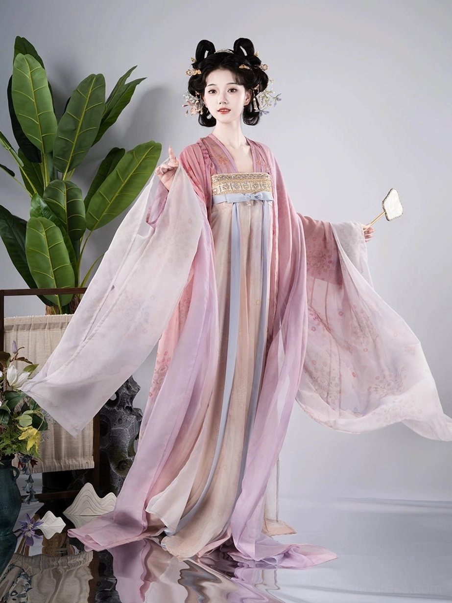 Three quarter view of traditional Tang style Qixiong Ruqun Hanfu showing fluttering chiffon sleeves, floral print fabric, and elegant gradient colors