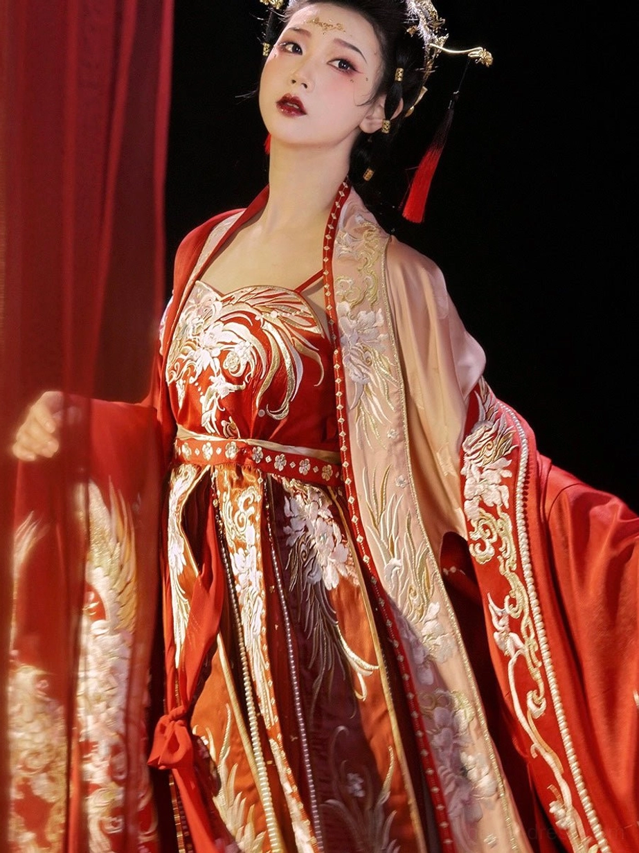 Close three quarter view of Tang Dynasty red phoenix bridal Hanfu showing ornate embroidery sash and traditional bridal headdress