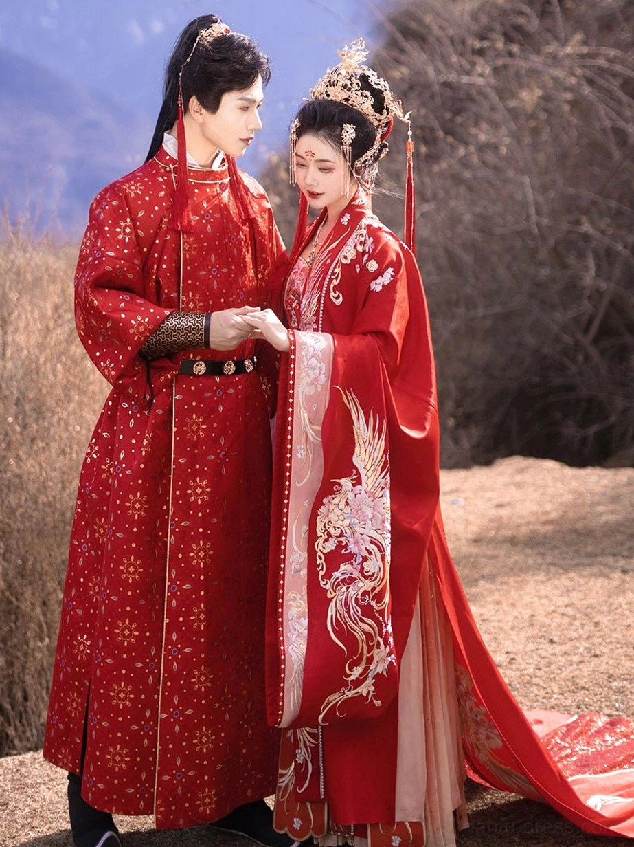 Traditional Chinese wedding couple wearing coordinated red ceremonial Hanfu with bride in Tang Dynasty phoenix gown