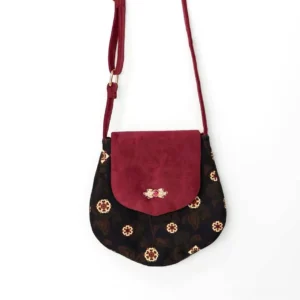 Tang-inspired crimson floral crossbody Chinese bag with wine red suede-look flap, navy vintage flower fabric and decorative metal clasp front view