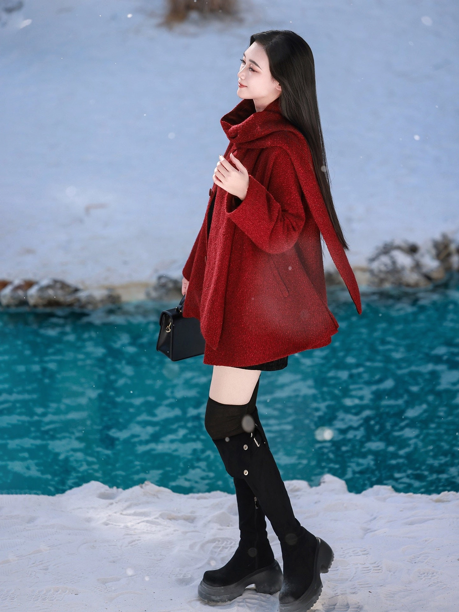 Coral red wool blend hanfu jacket styled with black tailored shorts over the knee boots and a matching long scarf