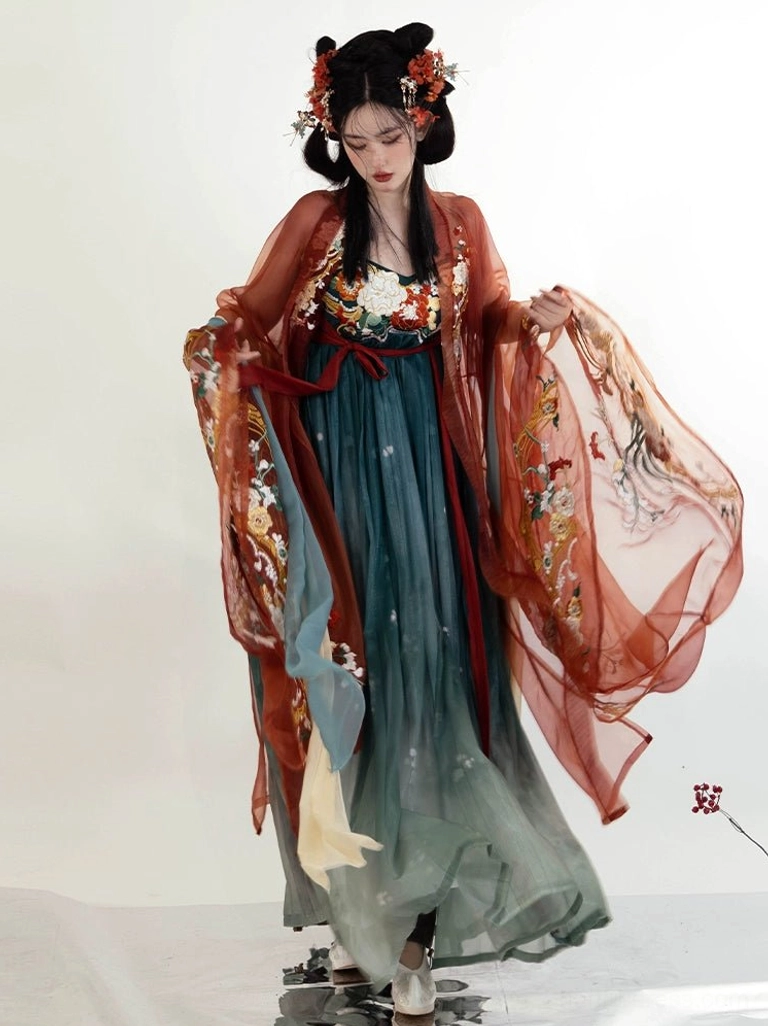 Side front view of a Tang-style Heziqun Hanfu dress with colorful floral chest embroidery, sheer wide sleeves, gradient teal skirt, and red sash