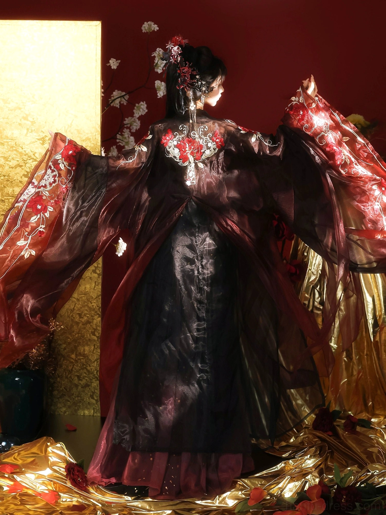 Three-quarter back view of Tang style Qixiong Ruqun Hanfu with embroidered shoulders, long black skirt, and elegant wine red sheer sleeves