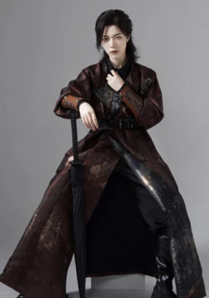 Modern Tang style charcoal marbled reversible hanfu robe with black lining bracers and wide waist belt in seated front view