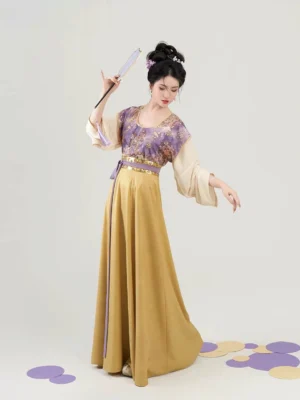 Full-body view of a modern Tang Dynasty hanfu set in taro purple and egg yolk mustard yellow with beizi overlay and flowing eight-panel skirt
