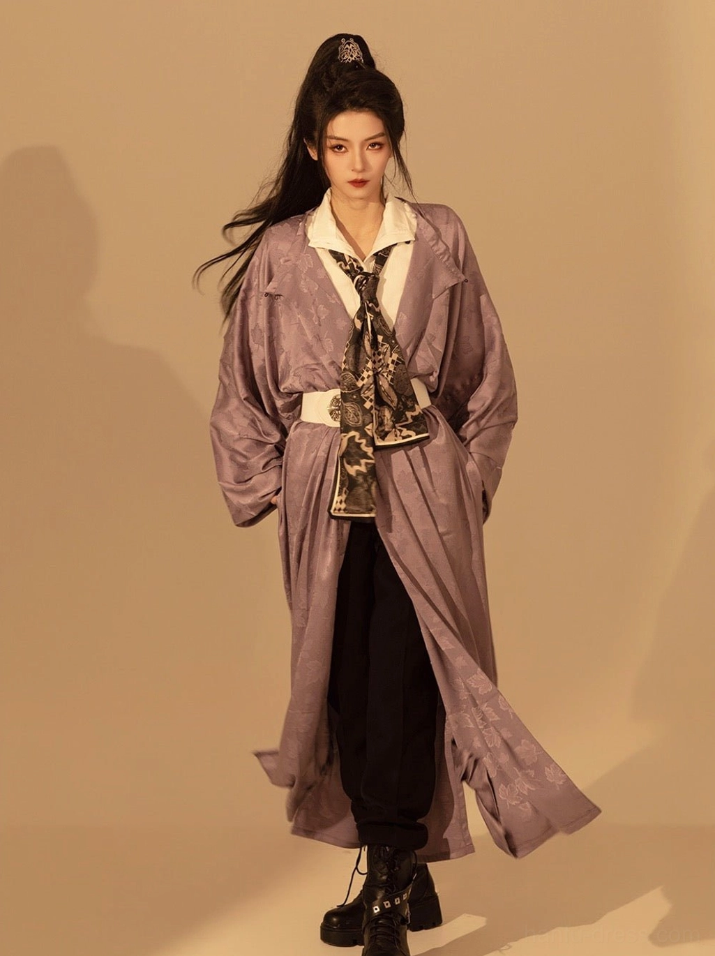 Full-length front view of a taro purple Tang Dynasty Hanfu robe with jacquard texture, flowing sleeves, white inner layer, printed scarf, and decorative waist belt