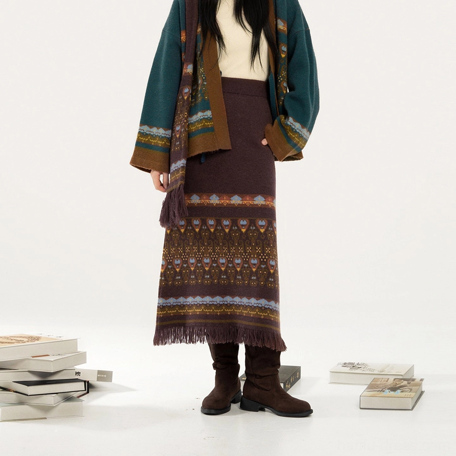 Teal modern Hanfu cardigan and jacquard midi skirt shown from the back with a full fringed hem