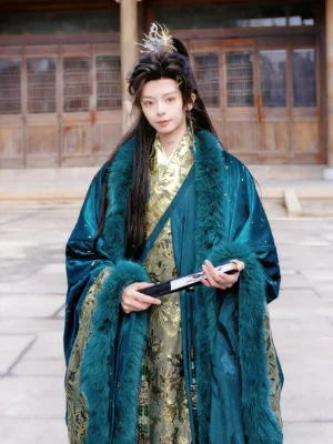Full length teal Hanfu for men in Song Dynasty inspired xianxia style with wide sleeves and gold inner layer in a traditional courtyard