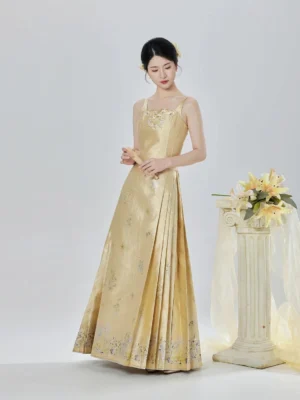 Full front view of Thousand Golden Lily modern Ming Dynasty Hanfu set featuring champagne brocade bustier, embroidered lily details and long pleated mamianqun skirt