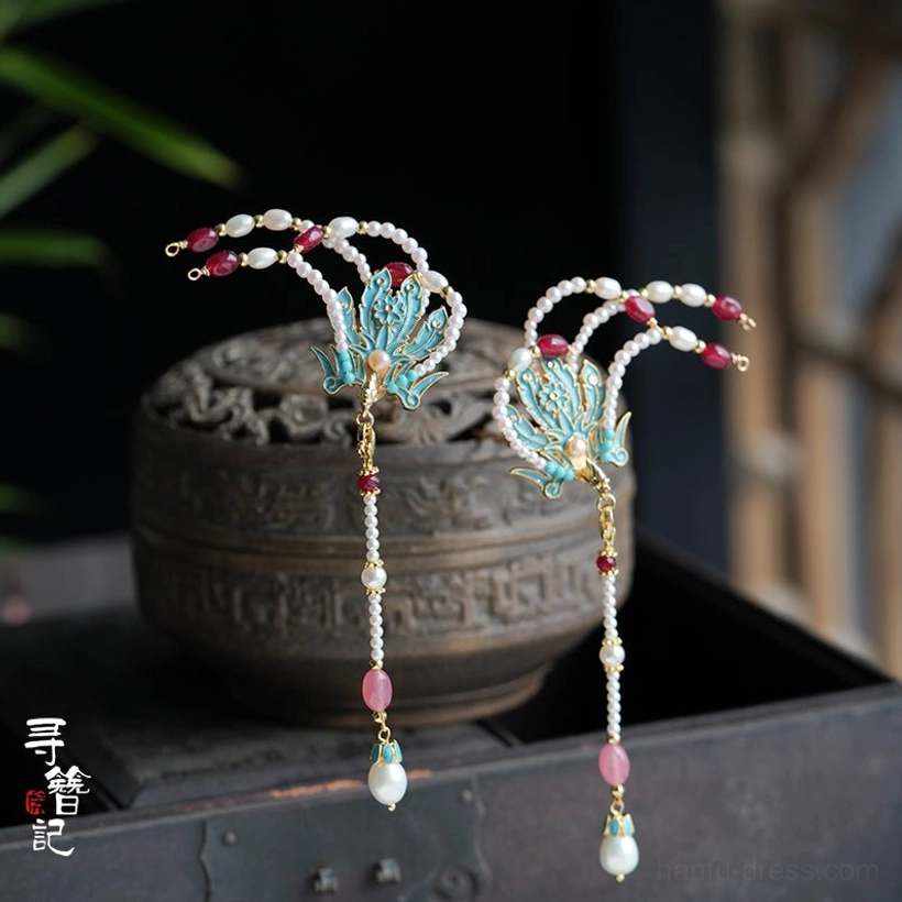Angled view of traditional blue cloisonne phoenix hanfu hair ornaments with layered beaded tassels