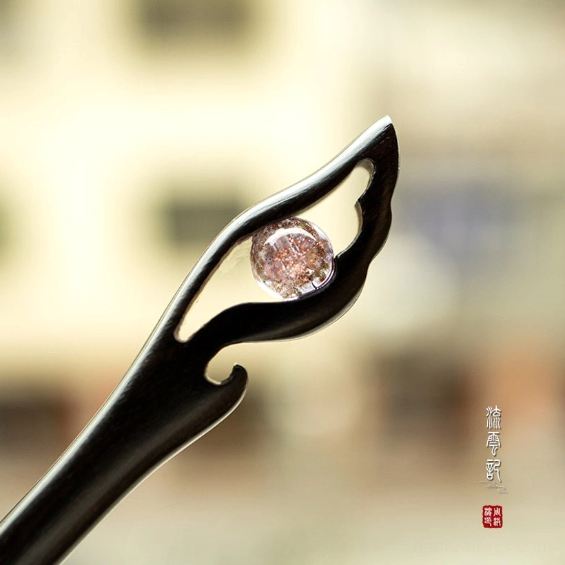 Purple crackle glass traditional Chinese black wooden hair stick with carved wing ornament