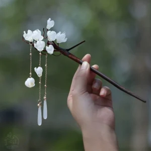 Traditional Chinese floral wooden hair stick with white resin flower clusters and delicate tassel pendant for Hanfu hairstyles