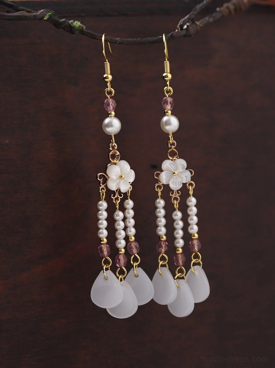 Traditional Chinese flower tassel earrings with multiple pearl strands white floral charms purple accents and vintage gold details