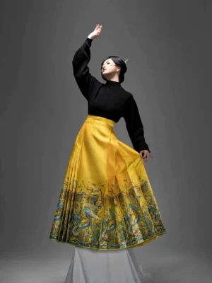 Dynamic low-angle view of a traditional Chinese Mamian skirt outfit showing the elegant pleated flare and bright kingfisher hem print