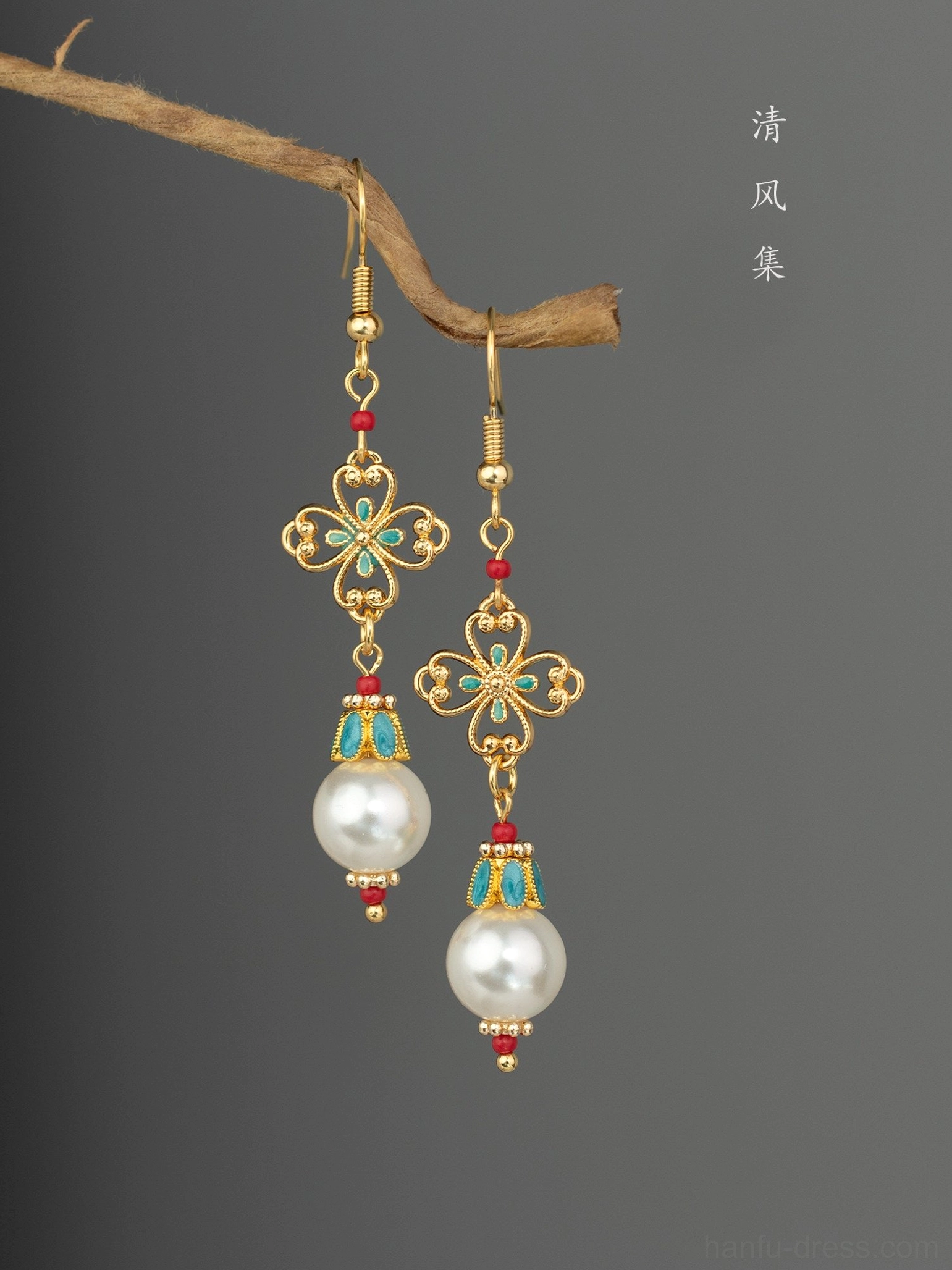 Traditional Chinese pearl drop earrings for Hanfu and Qipao featuring ornate gold charms colorful accents and handcrafted antique jewelry details side view