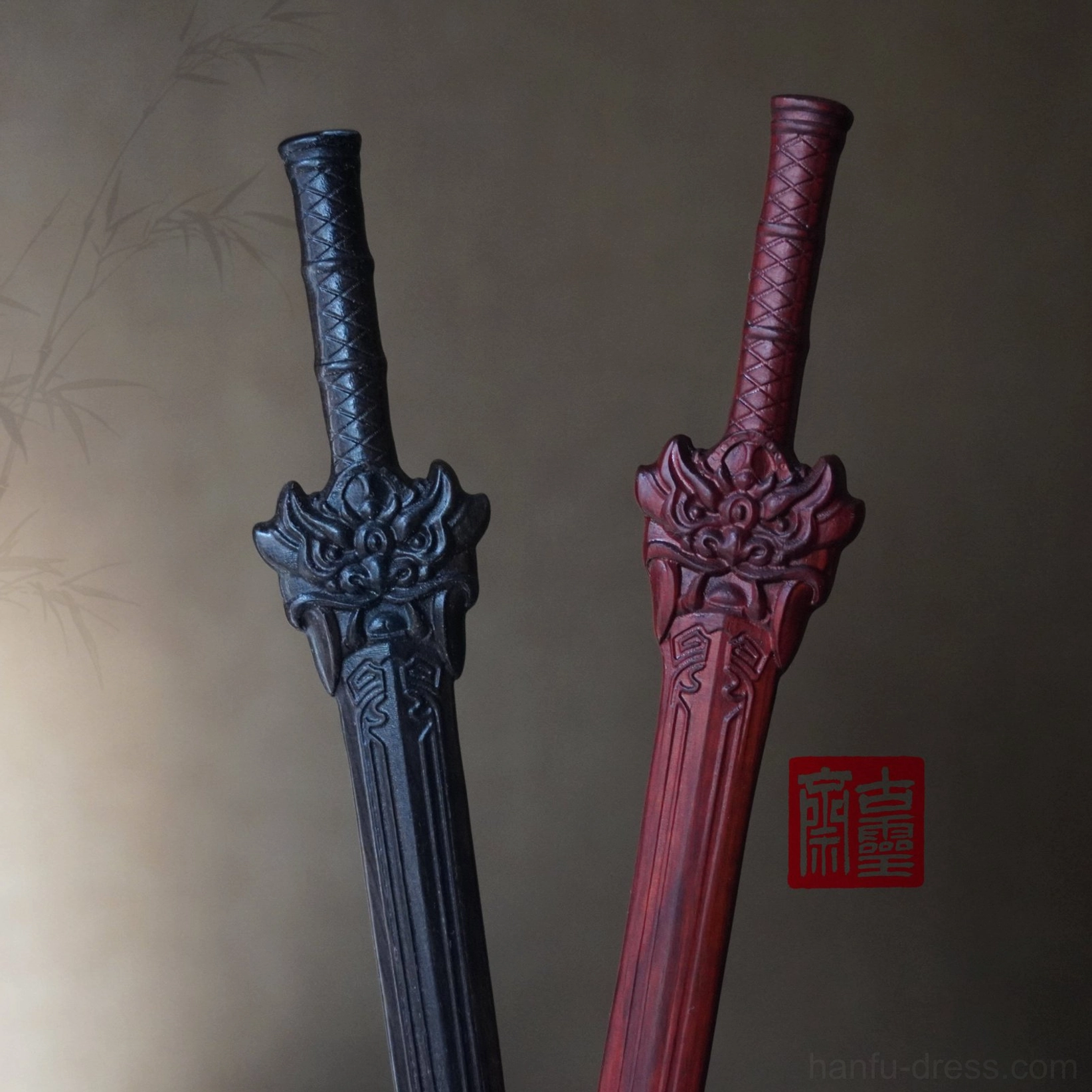 Traditional Chinese sword-shaped hair stick designs in black and wine red with complete carved handles, beast head ornaments, and engraved blade patterns